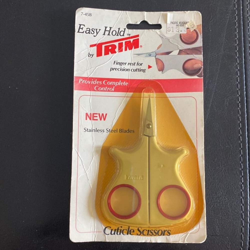 Vintage stainless steel cuticle scissors by TRIM . Easy hold made in Germany